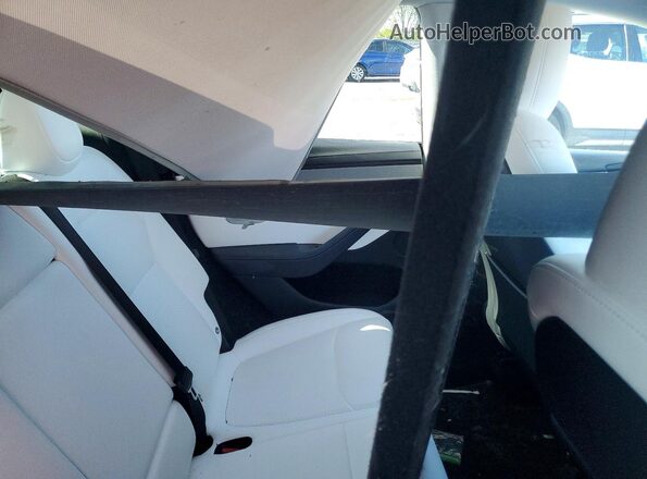 7SAYGDEE9TF371368 2026 TESLA MODEL Charcoal Вид задньої частини салону