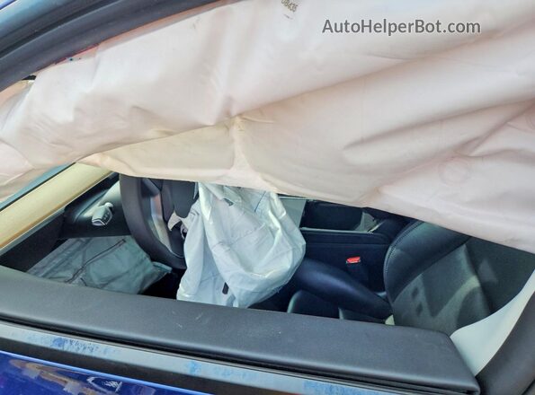 7SAYGDEEXNF430074 2022 TESLA MODEL Blue Front interior view