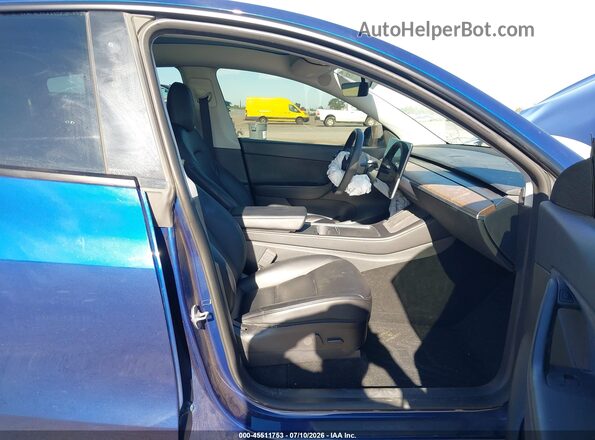 7SAYGDEEXNF485236 2022 TESLA MODEL Y Blue Widok wnętrza z przodu