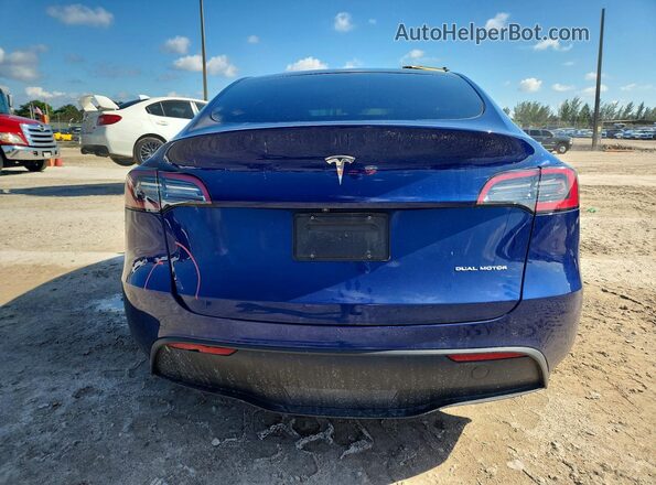 7SAYGDEEXPA068232 2023 TESLA MODEL Blue Rear view
