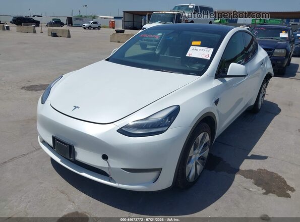 7SAYGDEEXPA095284 2023 TESLA MODEL Y White Առջևի ձախ երեք քառորդ տեսարան