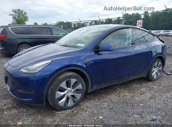 7SAYGDEEXPA145777 2023 TESLA MODEL Y Blue Առջևի ձախ երեք քառորդ տեսարան
