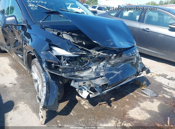 7SAYGDEEXPF706983 2023 TESLA MODEL Y Black Widok z przodu