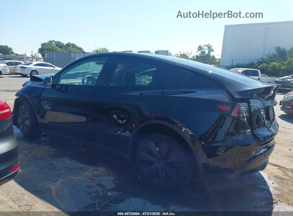 7SAYGDEEXPF706983 2023 TESLA MODEL Y Black Widok wnętrza z tyłu