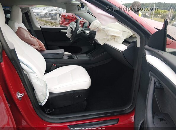 7SAYGDEEXPF865275 2023 TESLA MODEL Y Red Widok wnętrza z przodu