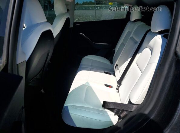 7SAYGDEEXRA288280 2024 TESLA MODEL Charcoal Հետևի նստատեղերի տեսք