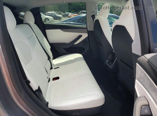 7SAYGDEEXTA382585 2026 TESLA MODEL Gray Rear seats view