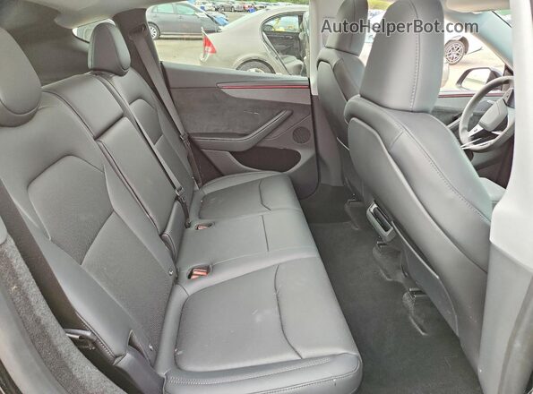 7SAYGDEEXTA477602 2026 TESLA MODEL Black Widok wnętrza z tyłu