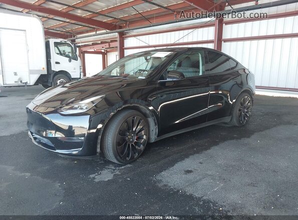 7SAYGDEF0NF548949 2022 TESLA MODEL Y Black Vista tres cuartos delantera izquierda
