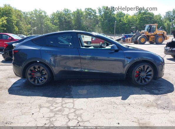 7SAYGDEF0RA253580 2024 TESLA MODEL Y Gray Սալոնի հետևի տեսք