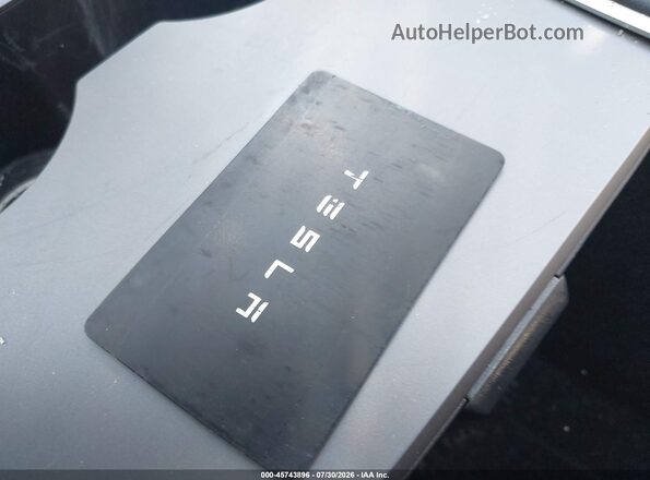 7SAYGDEF0RA253580 2024 TESLA MODEL Y Gray Առջևի վահանակի տեսք