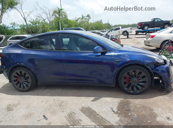 7SAYGDEF1NF562617 2022 TESLA MODEL Y Blue Rear interior view