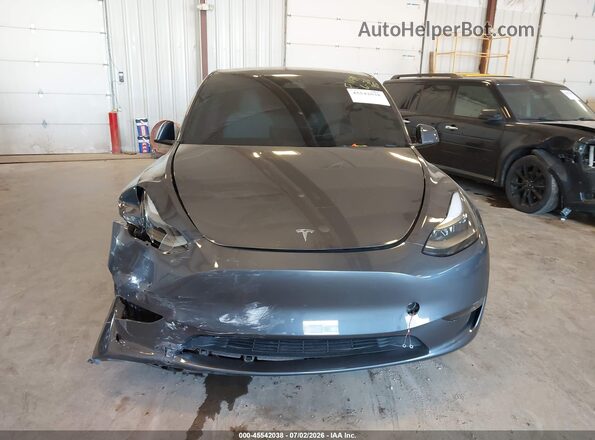 7SAYGDEF1PF646519 2023 TESLA MODEL Y Gray Widok deski rozdzielczej
