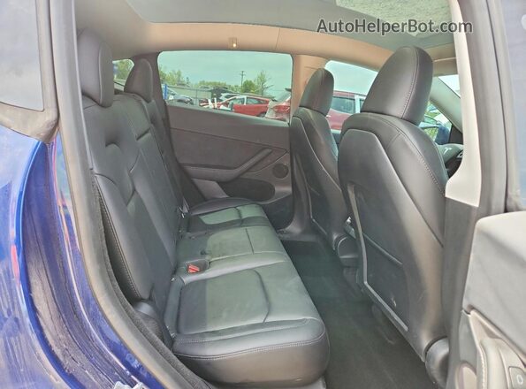 7SAYGDEF1PF856893 2023 TESLA MODEL Blue Widok wnętrza z tyłu