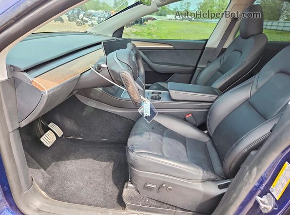 7SAYGDEF1PF856893 2023 TESLA MODEL Blue Widok wnętrza z przodu