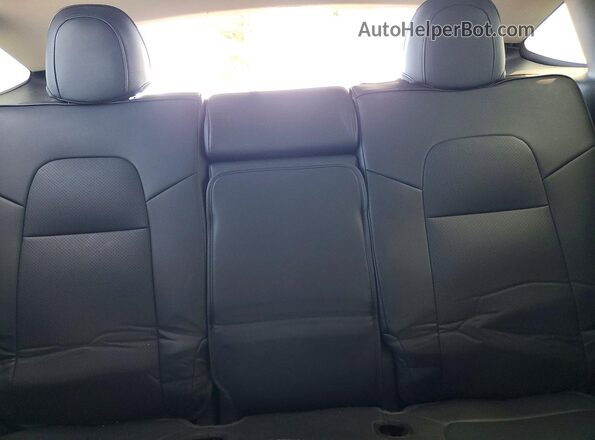 7SAYGDEF1RF079621 2024 TESLA MODEL Charcoal Rear seats view