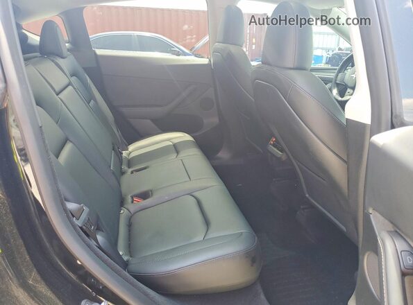 7SAYGDEF2PF764305 2023 TESLA MODEL Black Вид задніх сидінь