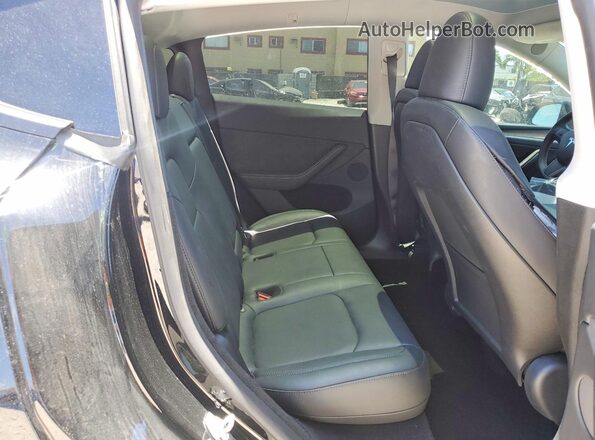 7SAYGDEF2RA278674 2024 TESLA MODEL Black უკანა სავარძლების ხედი