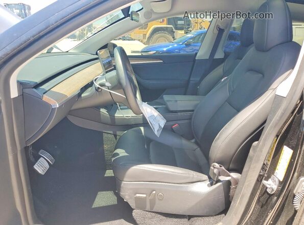 7SAYGDEF2RA278674 2024 TESLA MODEL Black წინა სალონის ხედი
