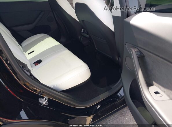7SAYGDEF2RA296673 2024 TESLA MODEL Y Black Vista de la etiqueta del VIN