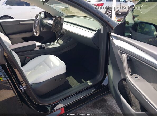 7SAYGDEF2RA296673 2024 TESLA MODEL Y Black Vista interior delantera