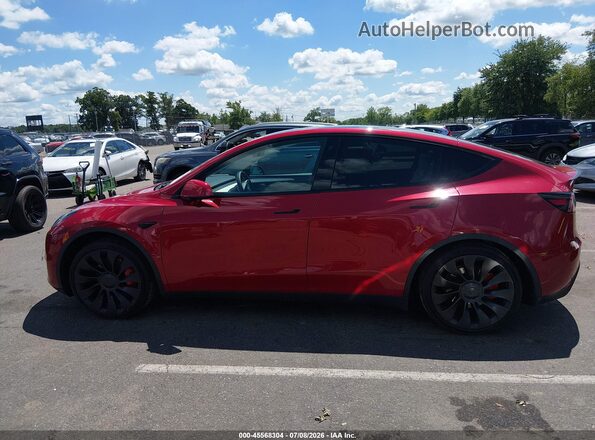 7SAYGDEF3PF624814 2023 TESLA MODEL Y Красный Вид задней части салона