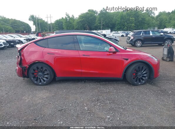 7SAYGDEF3PF773627 2023 TESLA MODEL Y Red Սալոնի հետևի տեսք