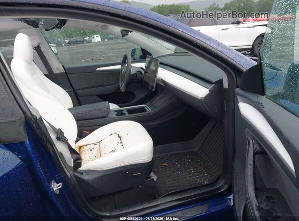 7SAYGDEF3RA268218 2024 TESLA MODEL Y Blue წინა სალონის ხედი