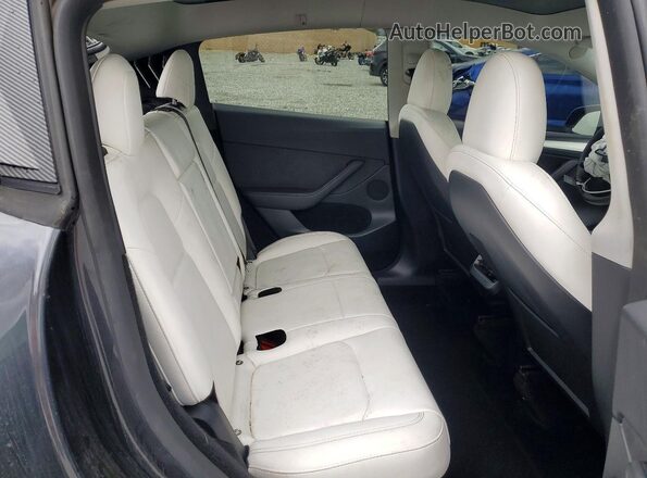 7SAYGDEF3RF066031 2024 TESLA MODEL Угольный Вид задней части салона
