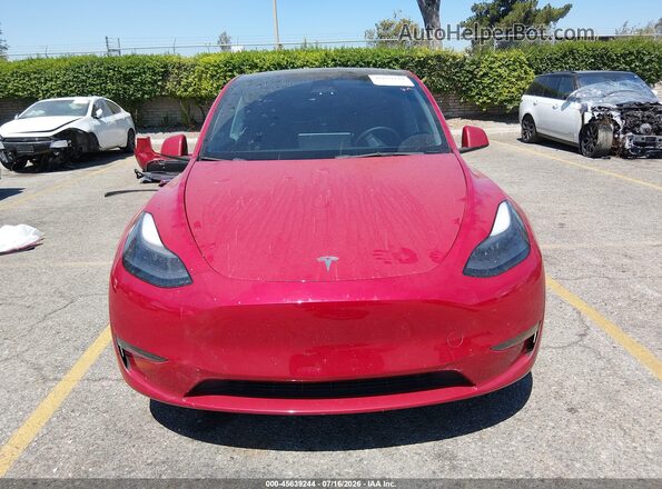 7SAYGDEF4PF606371 2023 TESLA MODEL Y Red Vista interior trasera