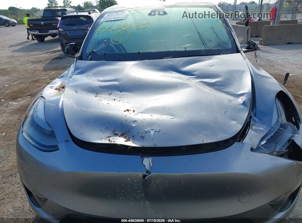 7SAYGDEF5RA309948 2024 TESLA MODEL Y Gray Vista frontal