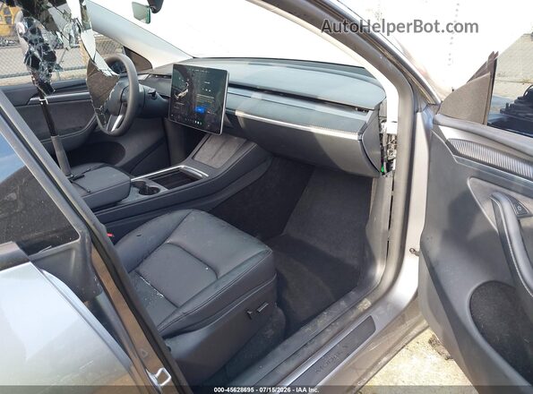7SAYGDEF5RA309948 2024 TESLA MODEL Y Gray Vista interior delantera