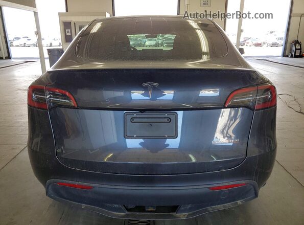 7SAYGDEF5RA330539 2024 TESLA MODEL Charcoal Widok z tyłu