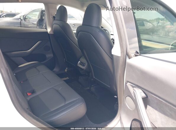 7SAYGDEF6PA049086 2023 TESLA MODEL Y White VIN կոդի պիտակի տեսք