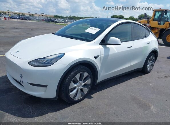 7SAYGDEF6PA049086 2023 TESLA MODEL Y White Առջևի ձախ երեք քառորդ տեսարան