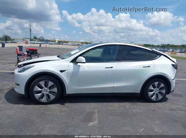 7SAYGDEF6PA049086 2023 TESLA MODEL Y White Սալոնի հետևի տեսք