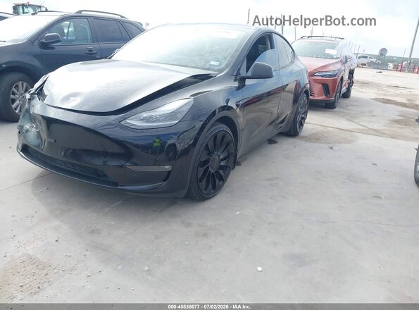 7SAYGDEF6PF895818 2023 TESLA MODEL Y Black Vista tres cuartos delantera izquierda