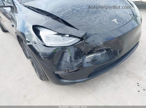 7SAYGDEF6PF895818 2023 TESLA MODEL Y Black Vista frontal