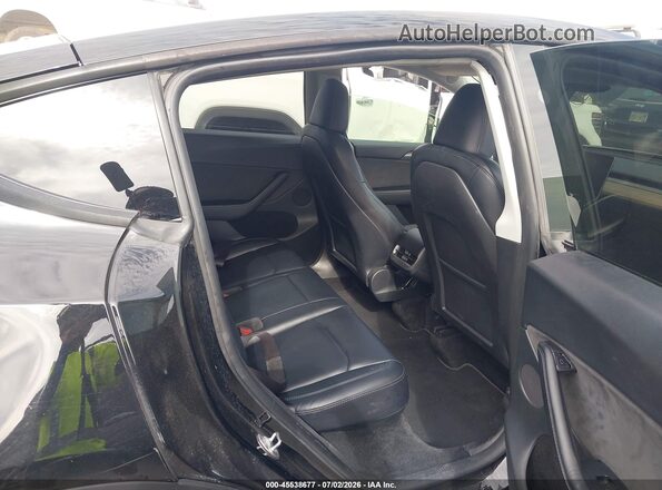7SAYGDEF6PF895818 2023 TESLA MODEL Y Black Vista de la etiqueta del VIN