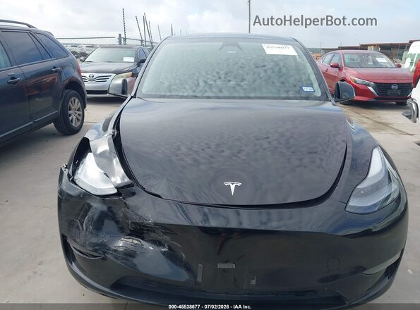 7SAYGDEF6PF895818 2023 TESLA MODEL Y Black Vista del salpicadero