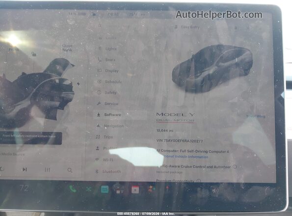 7SAYGDEF6RA320277 2024 TESLA MODEL Y Gray Widok tylnych siedzeń