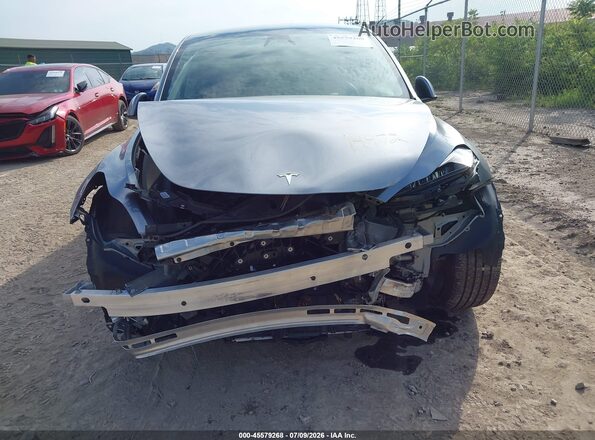 7SAYGDEF6RA320277 2024 TESLA MODEL Y Gray Widok z przodu
