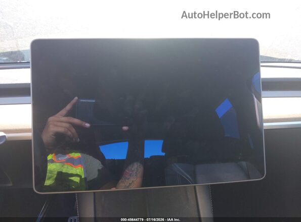 7SAYGDEF7NF346237 2022 TESLA MODEL Y Gray Vista de los asientos traseros
