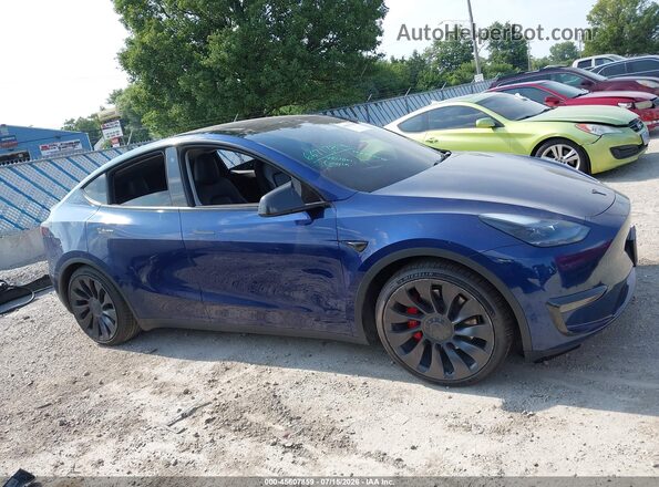7SAYGDEF7PF667178 2023 TESLA MODEL Y Blue Вид задньої частини салону