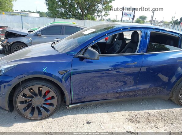 7SAYGDEF7PF667178 2023 TESLA MODEL Y Blue Вид спереду