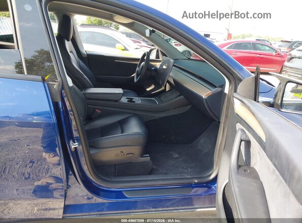 7SAYGDEF7PF667178 2023 TESLA MODEL Y Blue Вид салону спереду