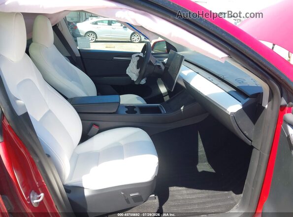 7SAYGDEF7PF740324 2023 TESLA MODEL Y Red Вид салону спереду