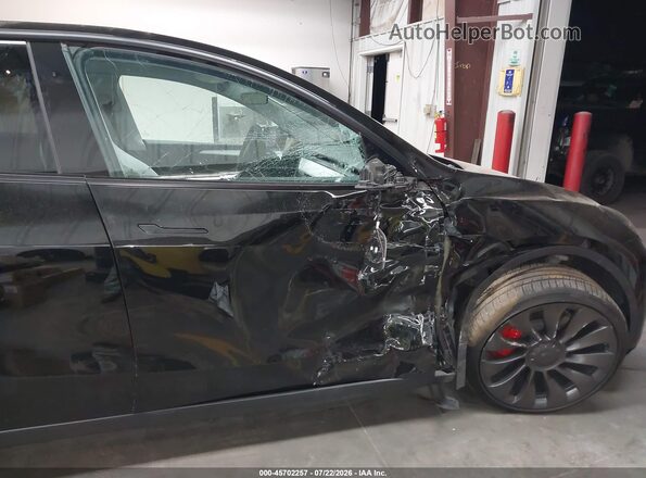 7SAYGDEF7PF913338 2023 TESLA MODEL Y Black წინა ხედი