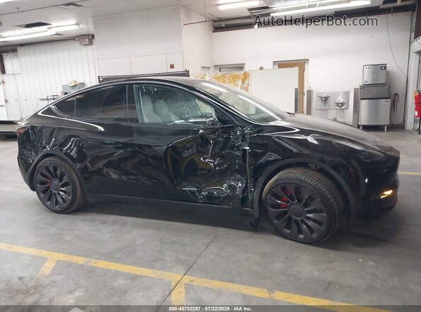 7SAYGDEF7PF913338 2023 TESLA MODEL Y Black წინა პანელის ხედი