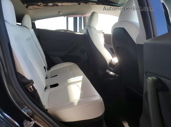 7SAYGDEF7RF020072 2024 TESLA MODEL Charcoal Սալոնի հետևի տեսք